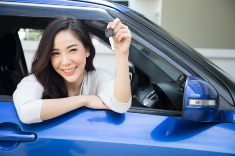 Young-Happy-Asian-Car-Driver-Graduate-with-car-keys