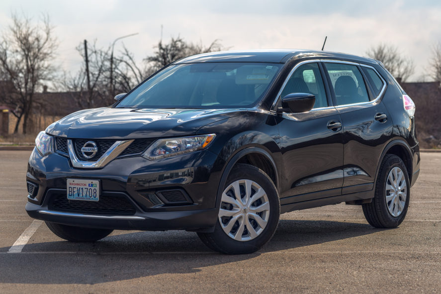 Photo-of-Black-Nissan-Rogue-Car-Parked-Outside