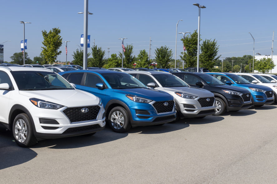 Row-of-White-Blue-Silver-and-Black-Hyundai-Cars-at-Car-Dealership